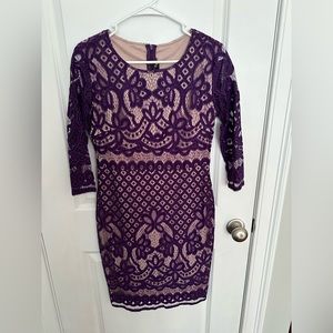 NWT Purple cocktail dress. Lace detail, lined. Size medium
